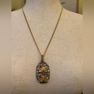 Gold and Silver Pendant Necklace with Intricate Design and 2 Dogs with Crystals